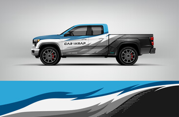 White and blue pickup truck wrap featuring clean aerodynamic flow lines. Editable vector EPS format. © Wrapin