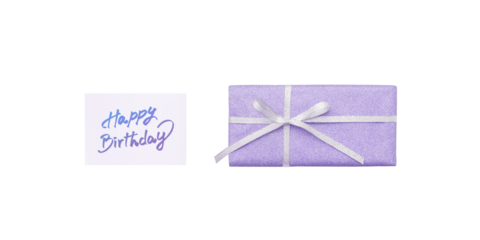 An overhead view of a pale purple gift box and a birthday card with blue-to-purple handwritten lettering