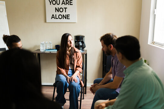 People participating in mental health support group therapy - Powered by Adobe
