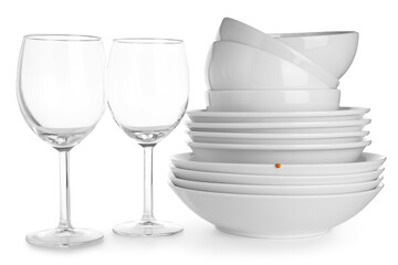 Set of different clean dishes isolated on white background, closeup