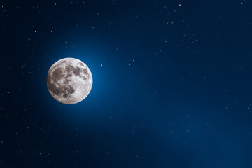 Full moon in the night sky. Background with moon for Halloween. 
