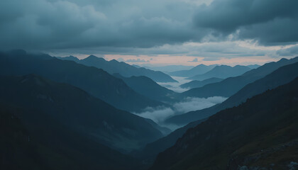 Moody mountain pass at twilight with layered ridgelines mist filled valley panoramic scene