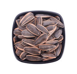 Healthy sun-flower seeds on a white background.