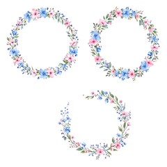 Three delicate floral wreaths, rendered in watercolor style, with soft pink and blue blossoms on green stems, isolated on white