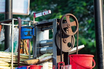 Traditional Sugarcane Juice Extracting Machine on Street Market