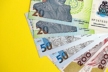 Nigerian naira money bills in big amount close up. Finance and banking concept