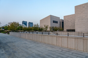 Fototapeta premium Stunning Urban Architecture with Contemporary Design and Serene Landscape Elements