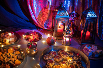 Iftar fast-breaking evening meal of Muslims in Ramadan at the time of adhan. Arabic lantern for...