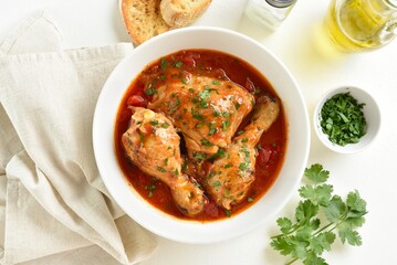 Chicken stew with tomatoes and herbs