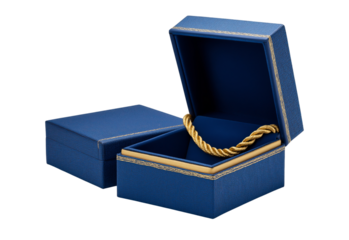 Blue jewelry box with open lid and gold chain isolated on a transparent background