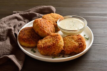 Breaded fish cakes from mashed potato and minced fish