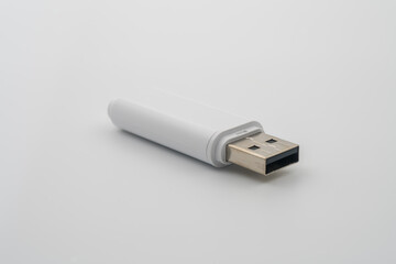 USB flash drive, USB Type-A connector, designed for portability, data exchange, compatible with multiple operating systems, plug-and-play device, commonly used for personal data transport and backup.