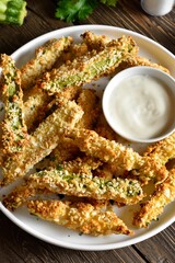 Crunchy zucchini breaded sticks with dip sauce