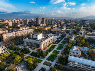 Elevated aerial view of the State Opera and Ballet Theater and surrounding square with the dense city buildings in the background