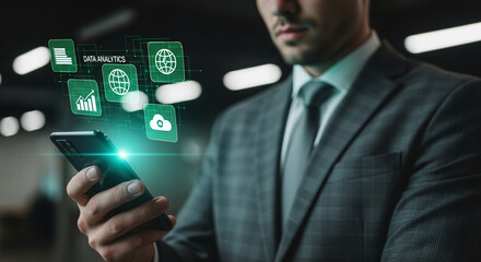 Man holding a smartphone with data analytics icons floating above, representing digital transformation and data management for business application