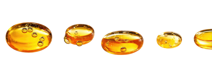 Golden liquid droplets, various sizes, with air bubbles