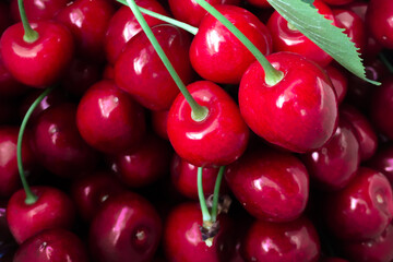 Background filled with ripe red cherries