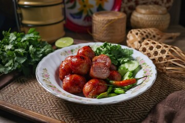 Isaan sausages in ceramic plate ,Thai called sai krok isan	
