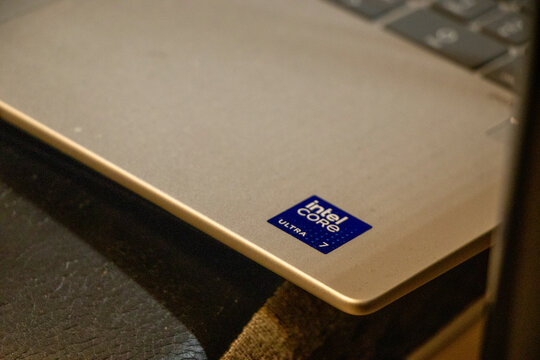 Warsaw, Poland - October 18, 2025: Close-up of an Intel Core i7 Ultra sticker on a laptop, highlighting advanced computing technology and design aesthetics.