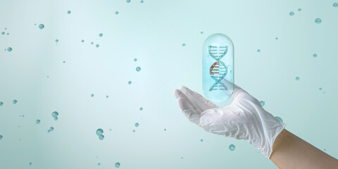 A hand showing section of DNA is breaking apart. The concept of genome editing. Innovative methods to treat genetic diseases. Genetic medicine