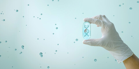 	
A hand showing section of DNA is breaking apart. The concept of genome editing. Innovative methods to treat genetic diseases. Genetic medicine