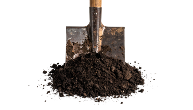 A shovel rests in a pile of dark earth, ready for digging. Black background