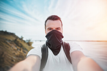 Person with face mask in natural setting