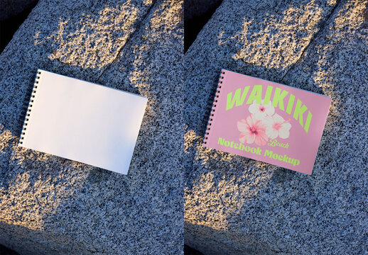Mockup of A blank notebook on a rough granite rock under soft sunlight