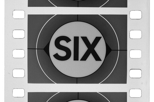 Film countdown frame with six text on a classic black and white cinema reel isolated. Transparent PNG image.