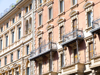 old European houses with various balconies on the main street of the old town