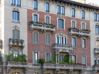 old European houses with various balconies on the main street of the old town