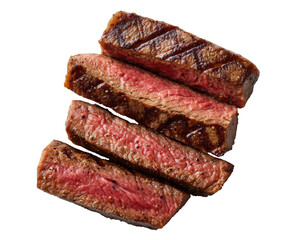 Four grilled steak slices, stacked, showing a range of doneness from medium-rare to slightly charred