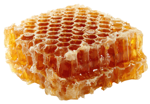 Close-up of a honeycomb.  Golden honey fills hexagonal cells