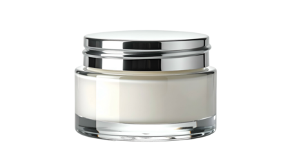 A small, clear glass jar with a silver lid, filled with white cream, isolated on black