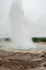 The powerful Stokkur Geyser in Iceland