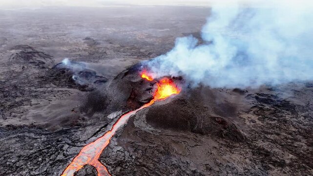 A stunning geological event in progress as new earth is formed. Molten magma from the Earth's mantle emerges at the surface, creating a flowing river of lava.