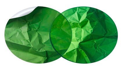 Two overlapping green circles with textured paper inside, one partially peeled