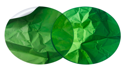 Two overlapping green circles with textured paper inside, one partially peeled