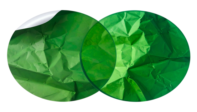Two overlapping green circles with textured paper inside, one partially peeled