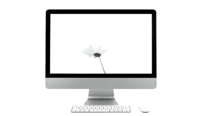 A silver all-in-one desktop computer displaying a monochrome flower on its bright screen