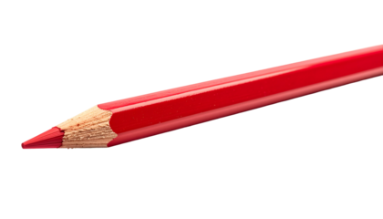 Macro shot of a sharp red pencil's tip with visible wood grain against a stark black backdrop