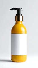 A stylish yellow pump bottle with a blank white label