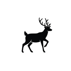 Black silhouette of a stag with antlers walking deer