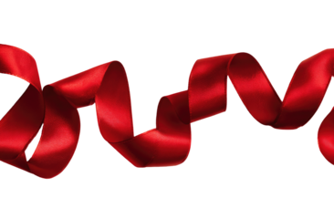 A close-up of a flowing, red ribbon with a swirly, elegant design against a black background.  The ribbon's texture appears glossy and smooth