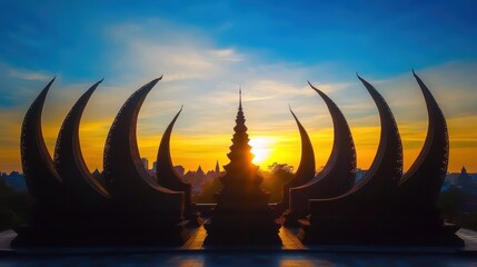 Silhouetted monuments at sunset with a beautiful sky