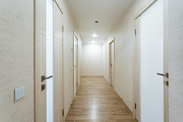 chic sleek hallway, contemporary bright minimalist corridor, stylish corridor with subtle lighting...