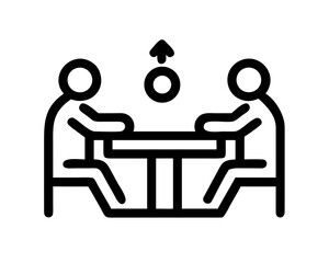 Two people sitting at a table with an arrow