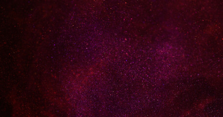 Blur glitter glare. Shimmer light. Defocused purple red color radiant illuminated shiny flash on...