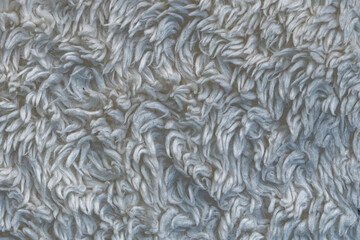 white plush fabric texture background , background pattern of soft warm material	