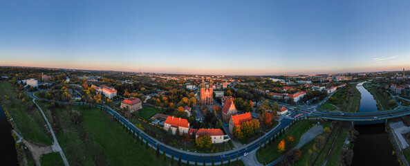 drone view of the Poznań city panorama at sunset